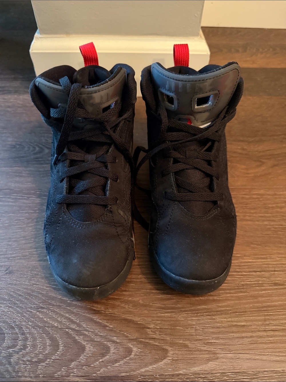 Jordan Kids Black High-Top Sneakers with Red Pull Tabs